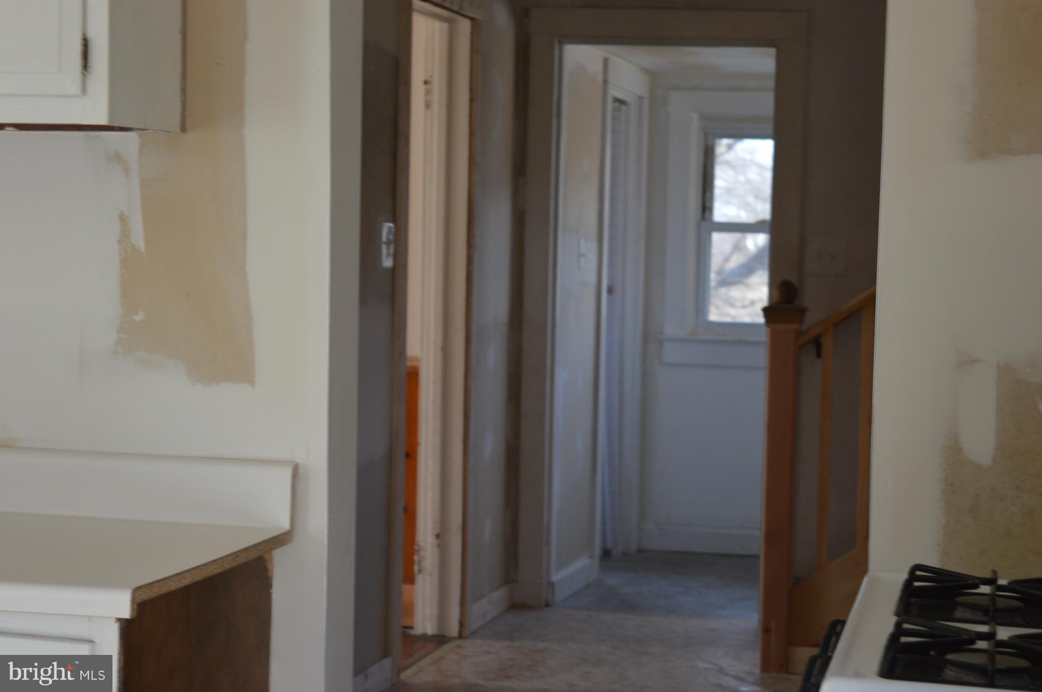 709 Pine Grove Road Bluemont, VA 20135 - Photo 15 of 23 Kitchen hallway goes out to half bath and laundry