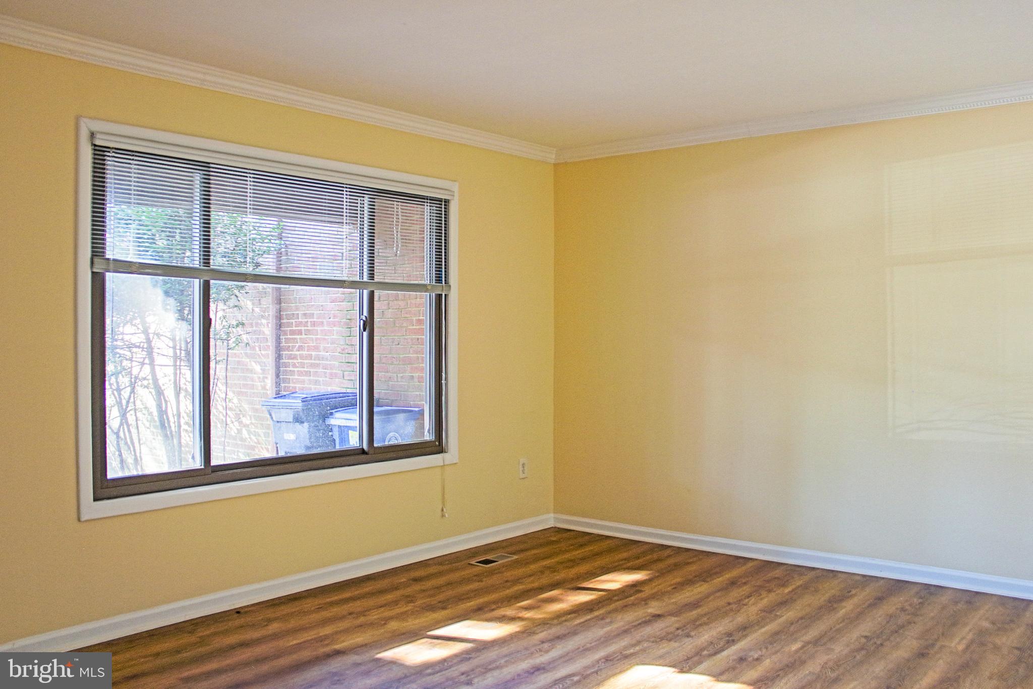 9040 Centerway Road Gaithersburg, MD 20879 - Photo 11 of 43 Bright and airy living room with natural light.