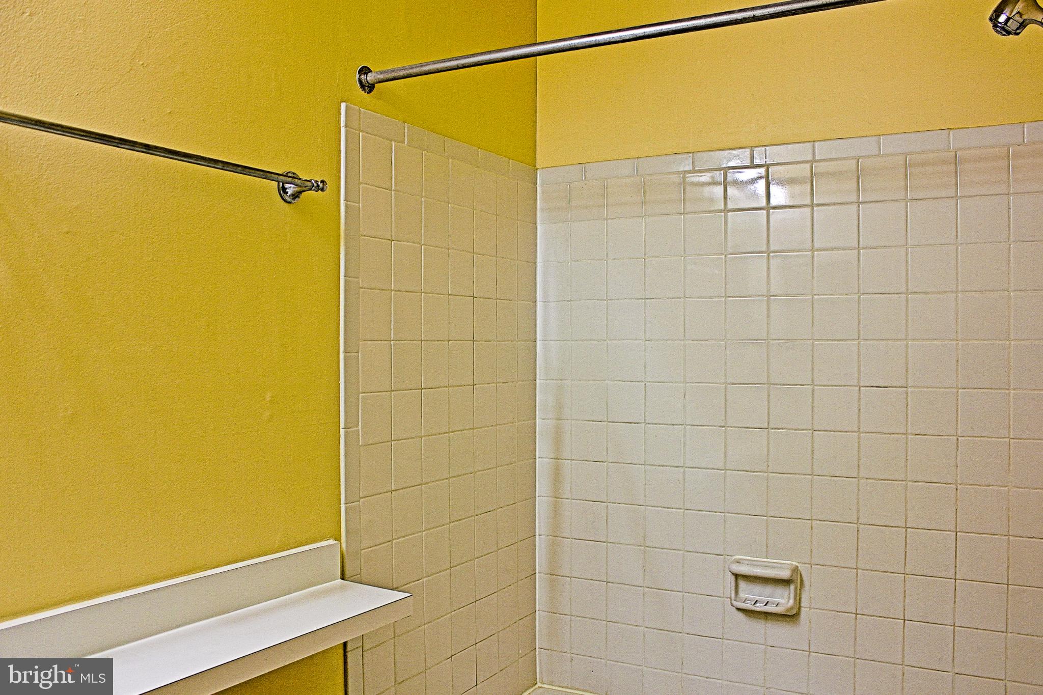 9040 Centerway Road Gaithersburg, MD 20879 - Photo 27 of 43 Bright and cheerful full upstairs bathroom.