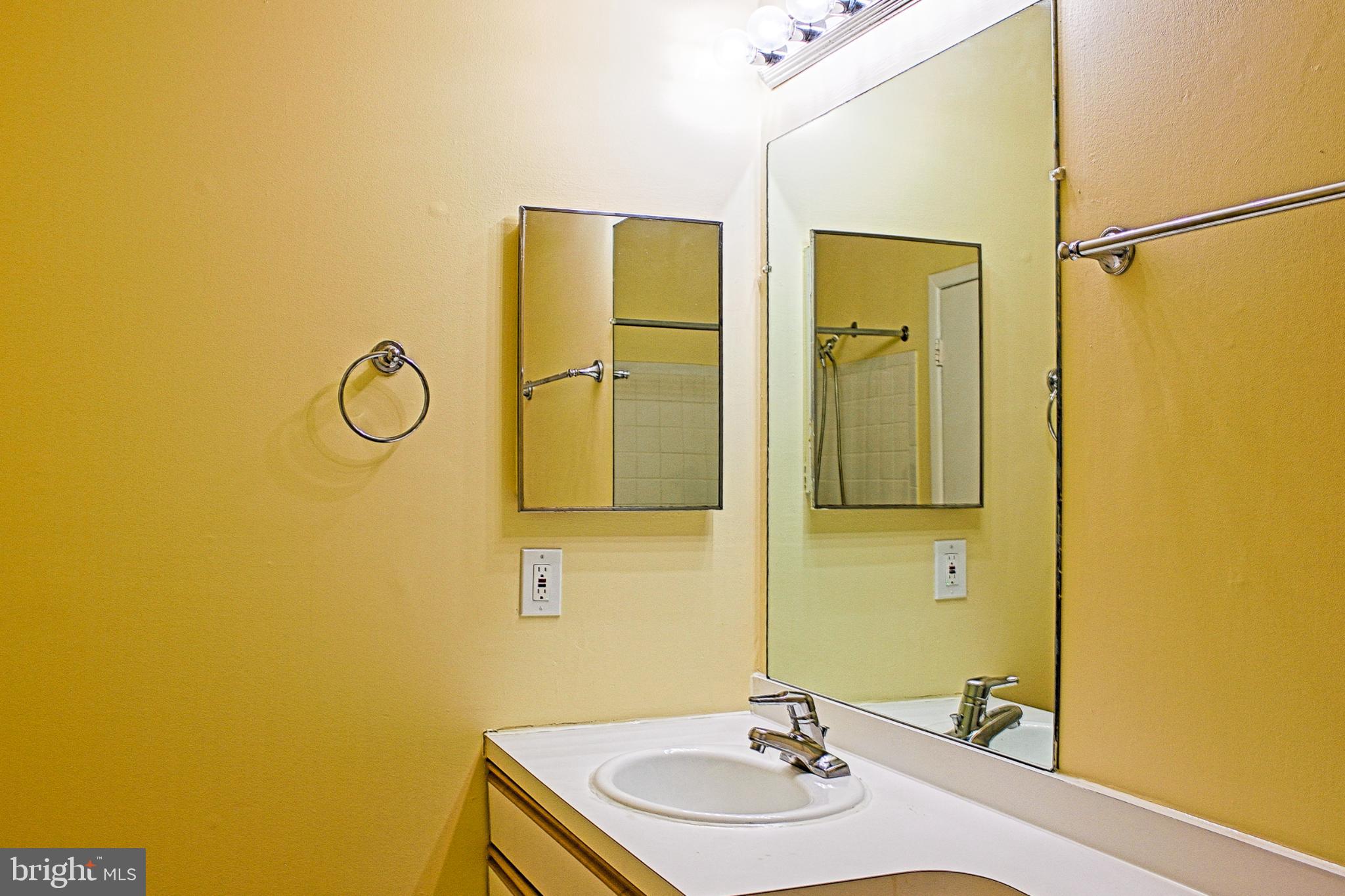 9040 Centerway Road Gaithersburg, MD 20879 - Photo 28 of 43 Bright upstairs full bathroom with modern touches.