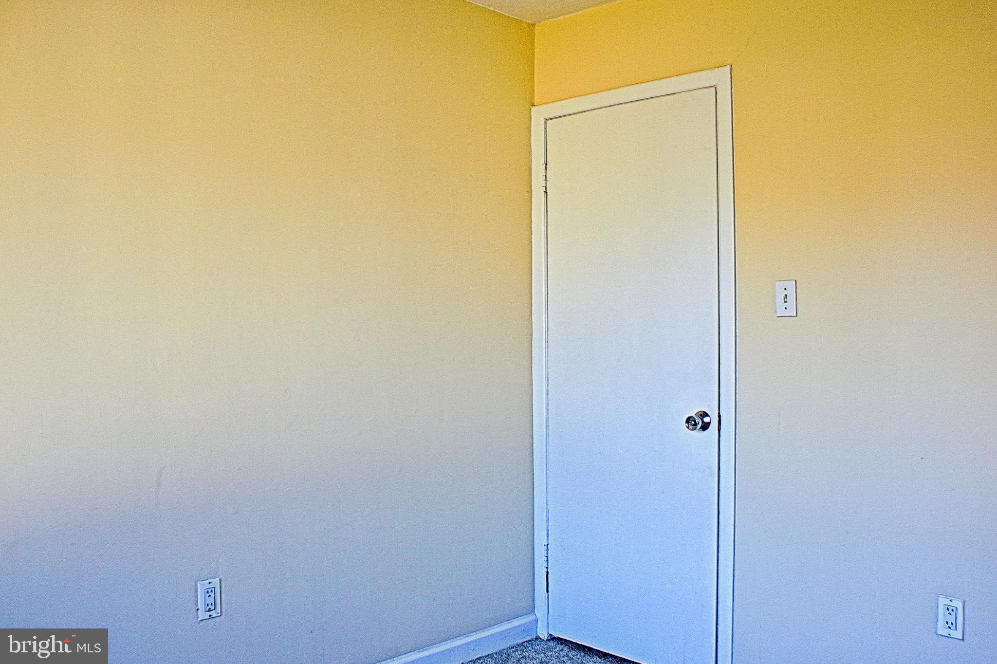 9040 Centerway Road Gaithersburg, MD 20879 - Photo 29 of 43 Bright walls of the upstairs second bedroom