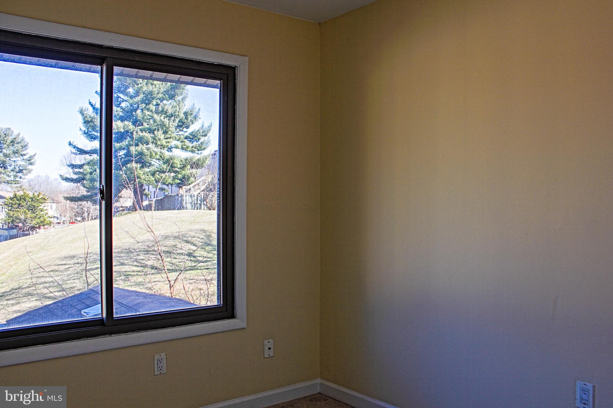 9040 Centerway Road Gaithersburg, MD 20879 - Photo 31 of 43 Bright room with scenic outdoor view.