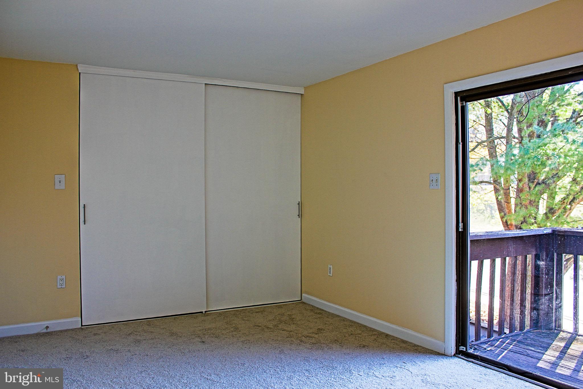 9040 Centerway Road Gaithersburg, MD 20879 - Photo 35 of 43 Bright, airy room with sliding doors.