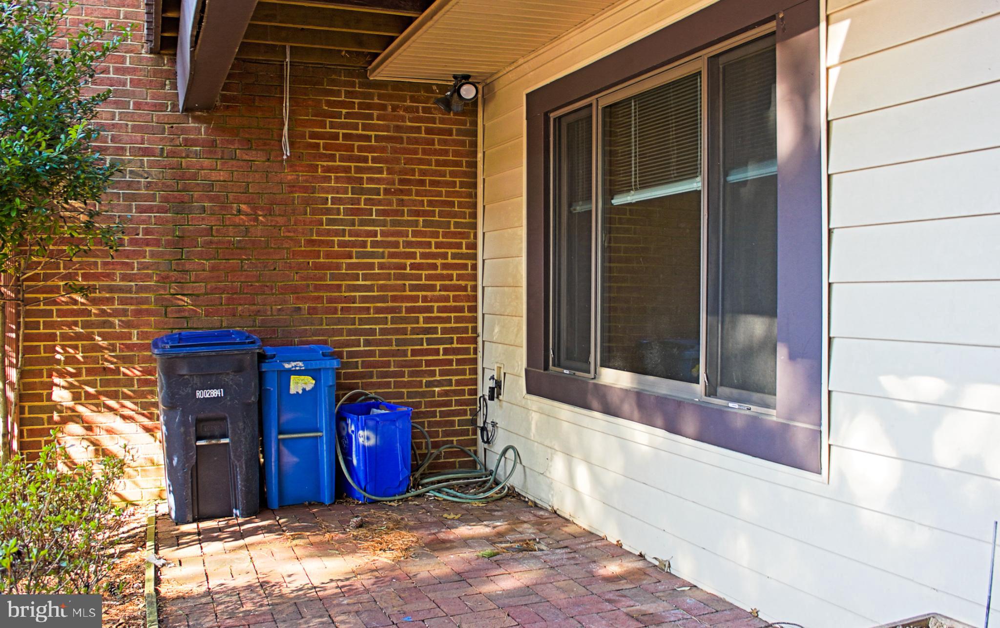 9040 Centerway Road Gaithersburg, MD 20879 - Photo 4 of 43 Charming brick patio area
