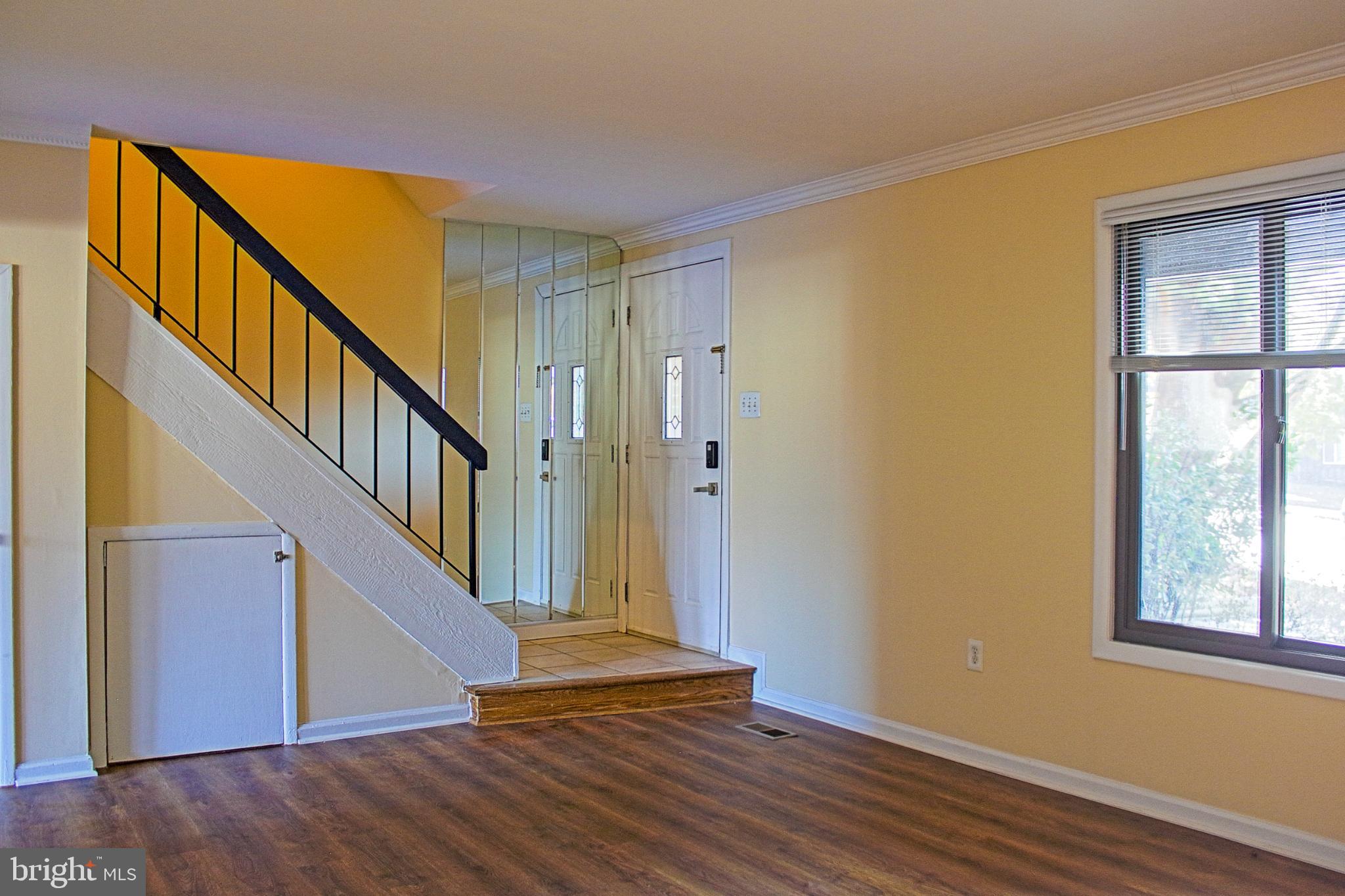 9040 Centerway Road Gaithersburg, MD 20879 - Photo 9 of 43 Bright entryway with inviting staircase.