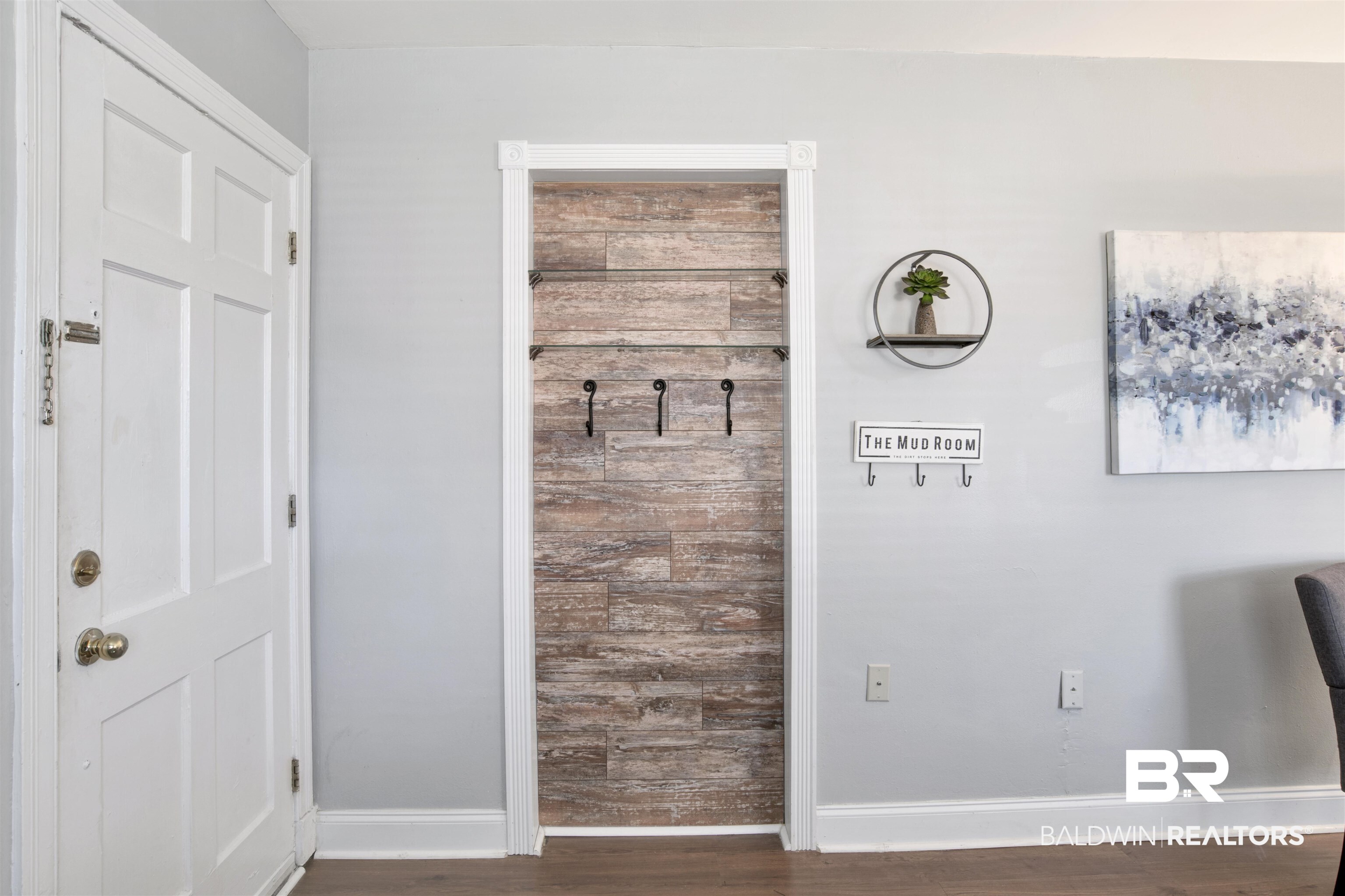 214 Upham Street, Unit 7A Mobile, AL 36607 - Photo 12 of 35 Mudroom featuring baseboards and dark wood finished floors