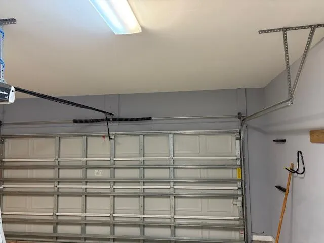 a bathroom with a shower and a shower