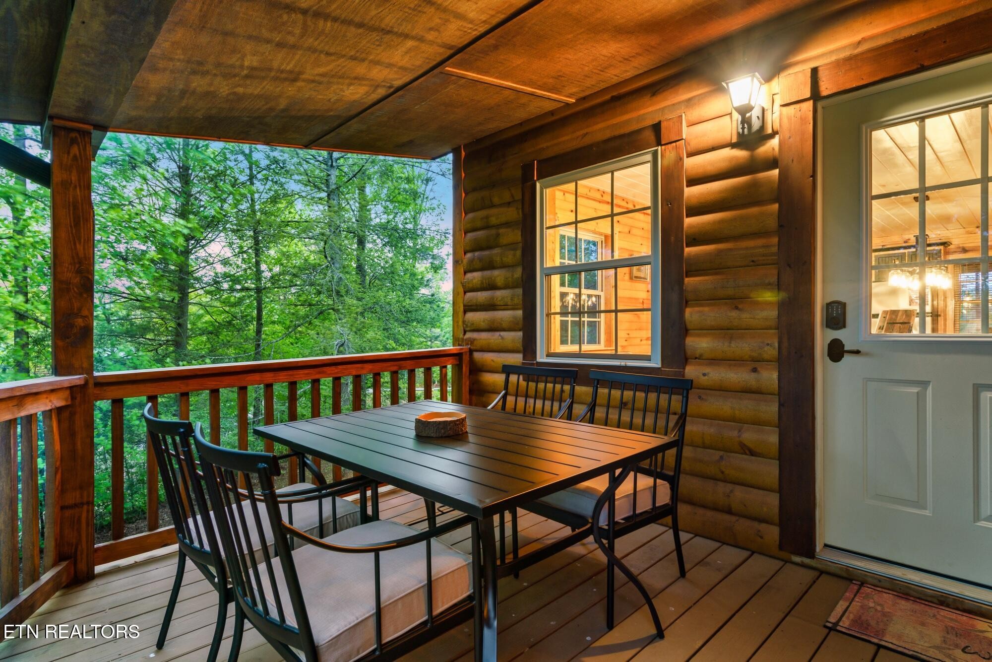 3330 Robeson Road Sevierville, TN 37862 - Photo 41 of 42 a view of a balcony with table and chairs