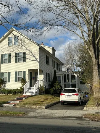 a view of street with parked cars