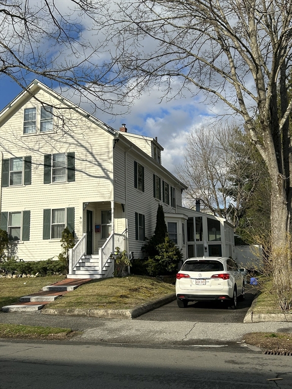 32 Parker Street, Unit 1 Lexington, MA 02421 - Photo 1 of 20 a view of street with parked cars