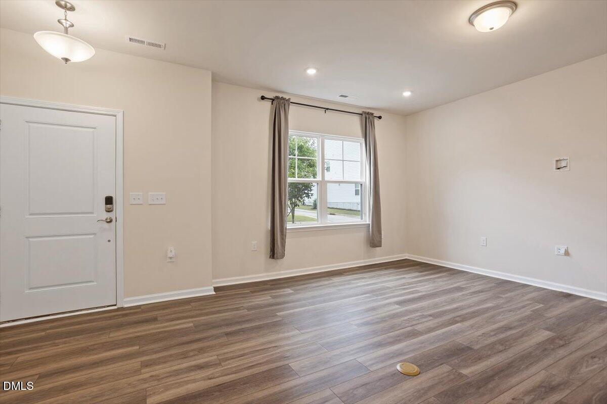 5702 Volos Avenue Raleigh, NC 27603 - Photo 10 of 34 Family Room