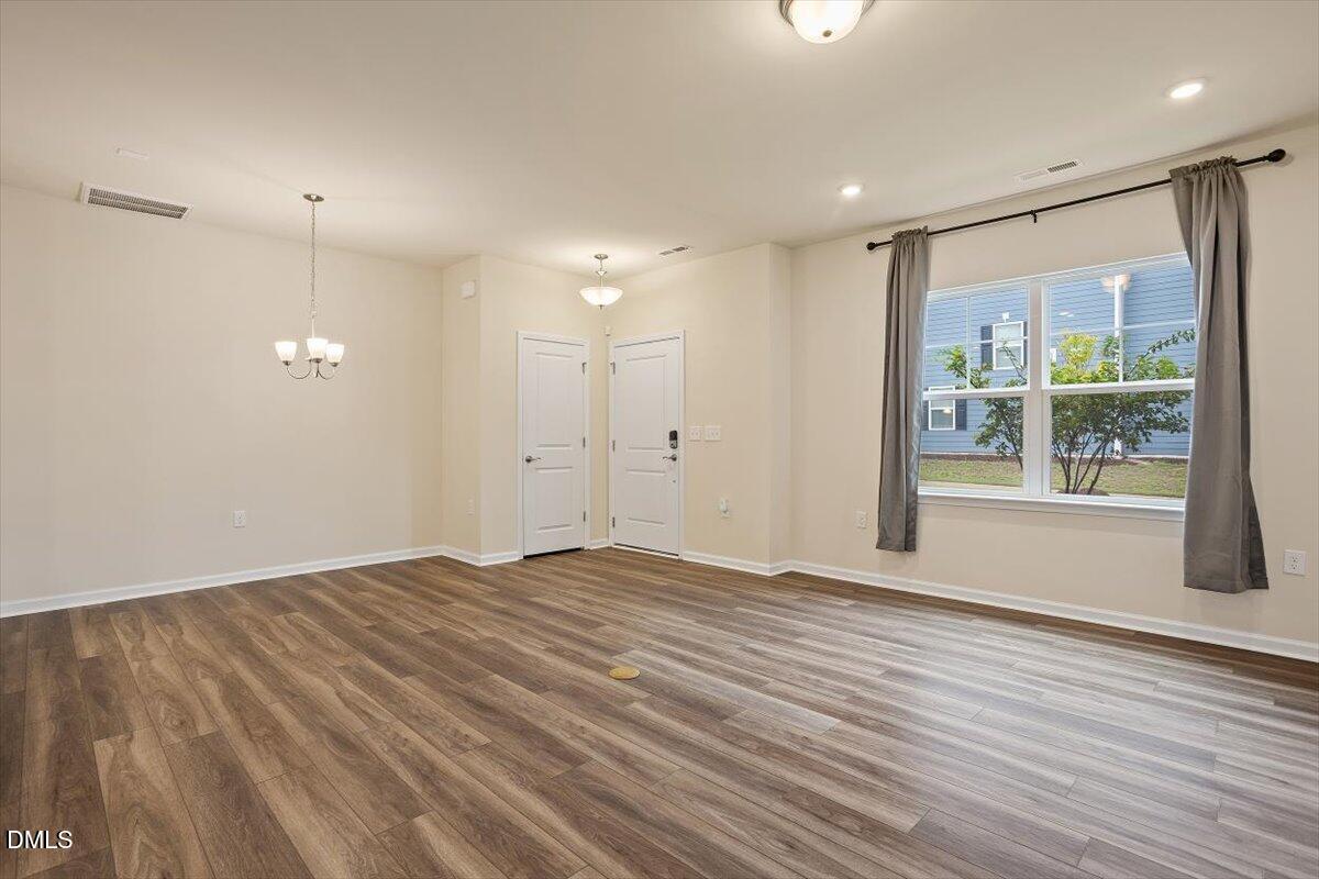 5702 Volos Avenue Raleigh, NC 27603 - Photo 13 of 34 Family Room