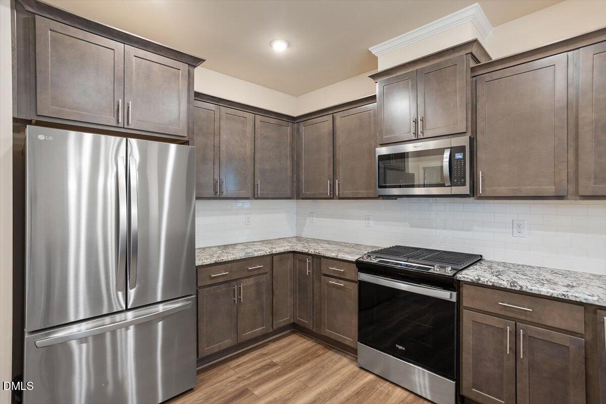 5702 Volos Avenue Raleigh, NC 27603 - Photo 21 of 34 Lots of Cabinets and Countertop Space