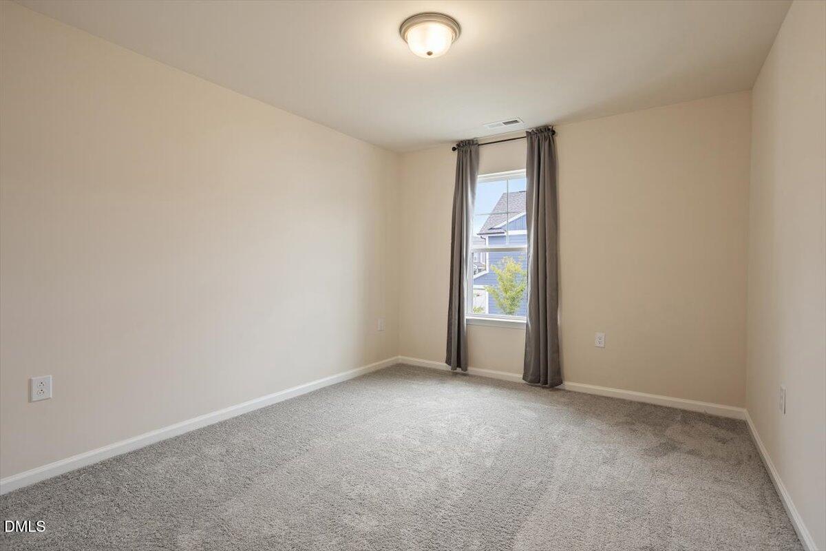 5702 Volos Avenue Raleigh, NC 27603 - Photo 28 of 34 Large 2nd Bedroom