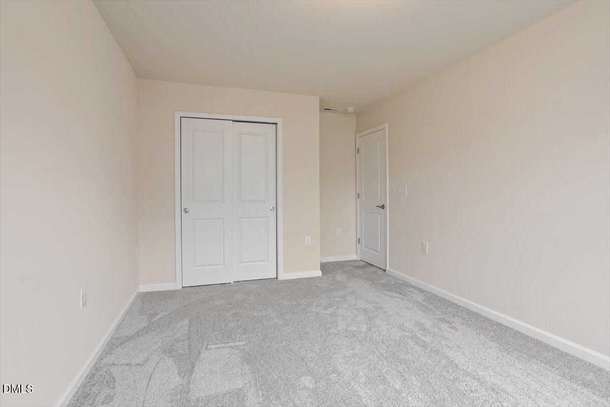 5702 Volos Avenue Raleigh, NC 27603 - Photo 30 of 34 3rd Bedroom