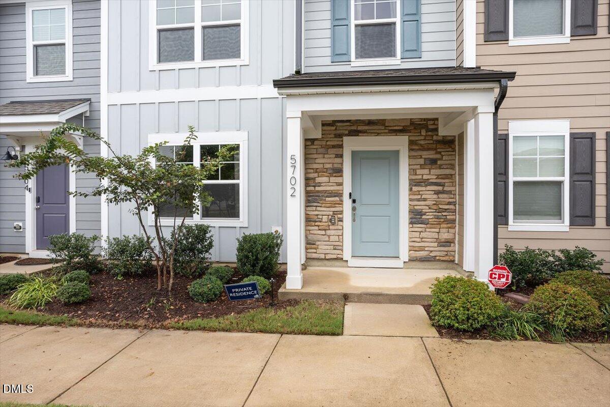 5702 Volos Avenue Raleigh, NC 27603 - Photo 5 of 34 Front Door