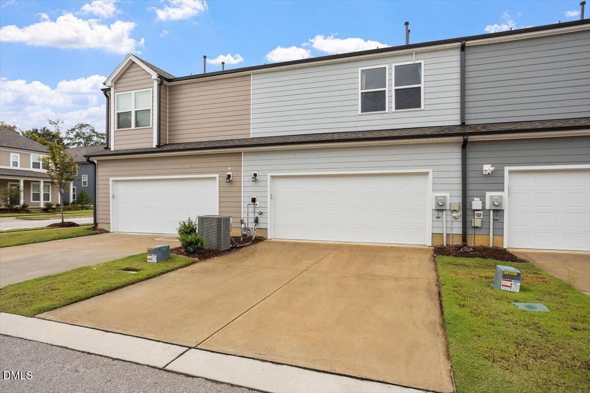 5702 Volos Avenue Raleigh, NC 27603 - Photo 7 of 34 2 Car Garage