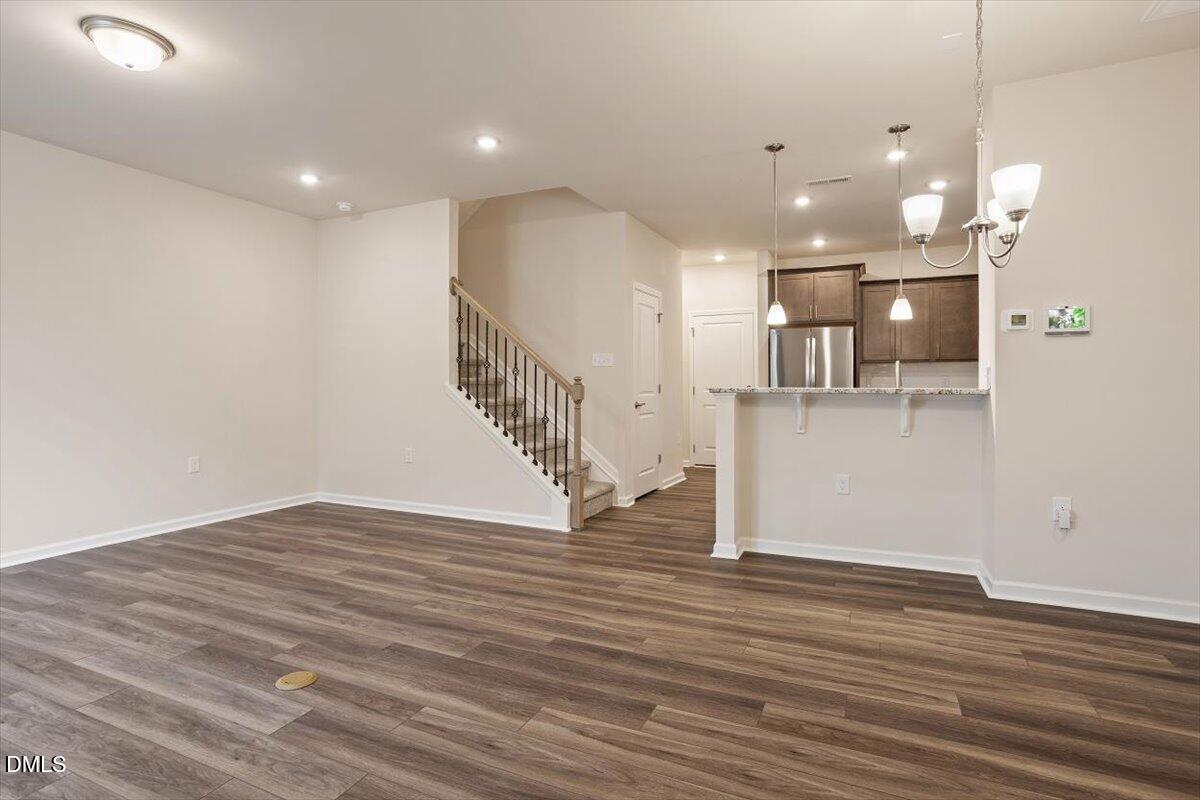 5702 Volos Avenue Raleigh, NC 27603 - Photo 8 of 34 Open Living Space