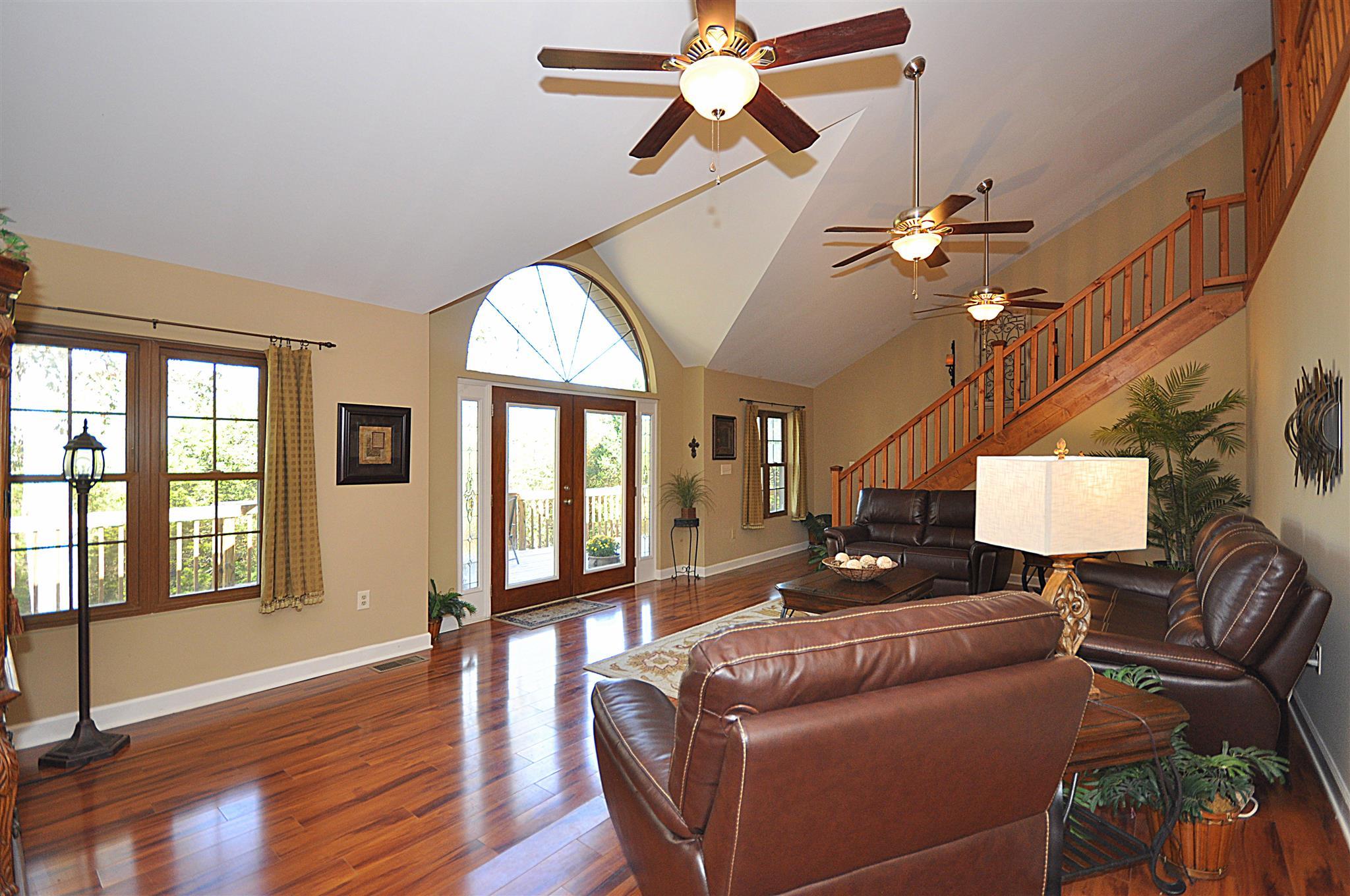 56 Buffalo Road Carthage, TN 37030 - Photo 3 of 22 a living room with furniture two window and wooden floor