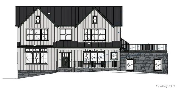 a view of a brick house and large windows