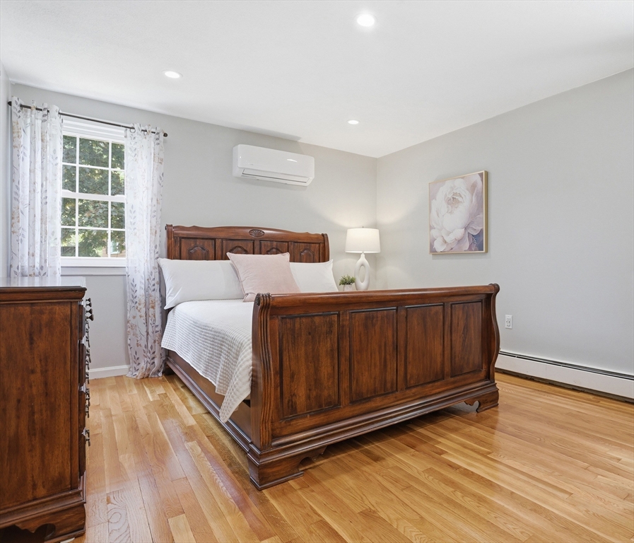 33 Simon Willard Road Acton, MA 01720 - Photo 21 of 42 a bed room with a bed and a window
