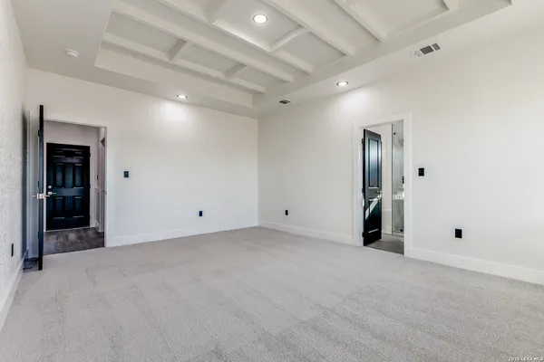 a bathroom with a shower and a sink