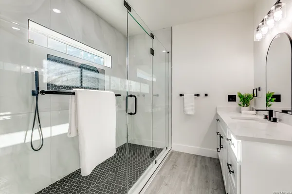 a view of an empty room with a window