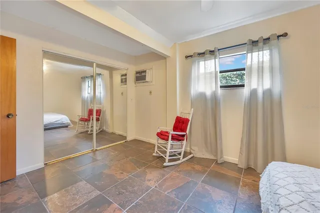 a picture of a wall with a white wall and white refrigerator