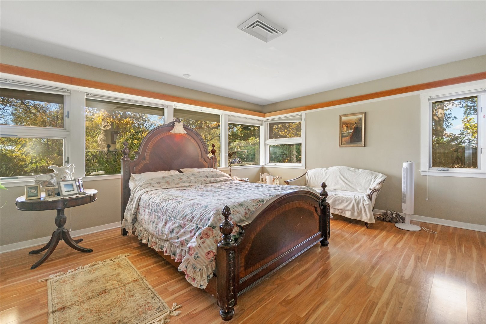 41W902 Hughes Road Elburn, IL 60119 - Photo 12 of 26 a bedroom with a bed and large windows
