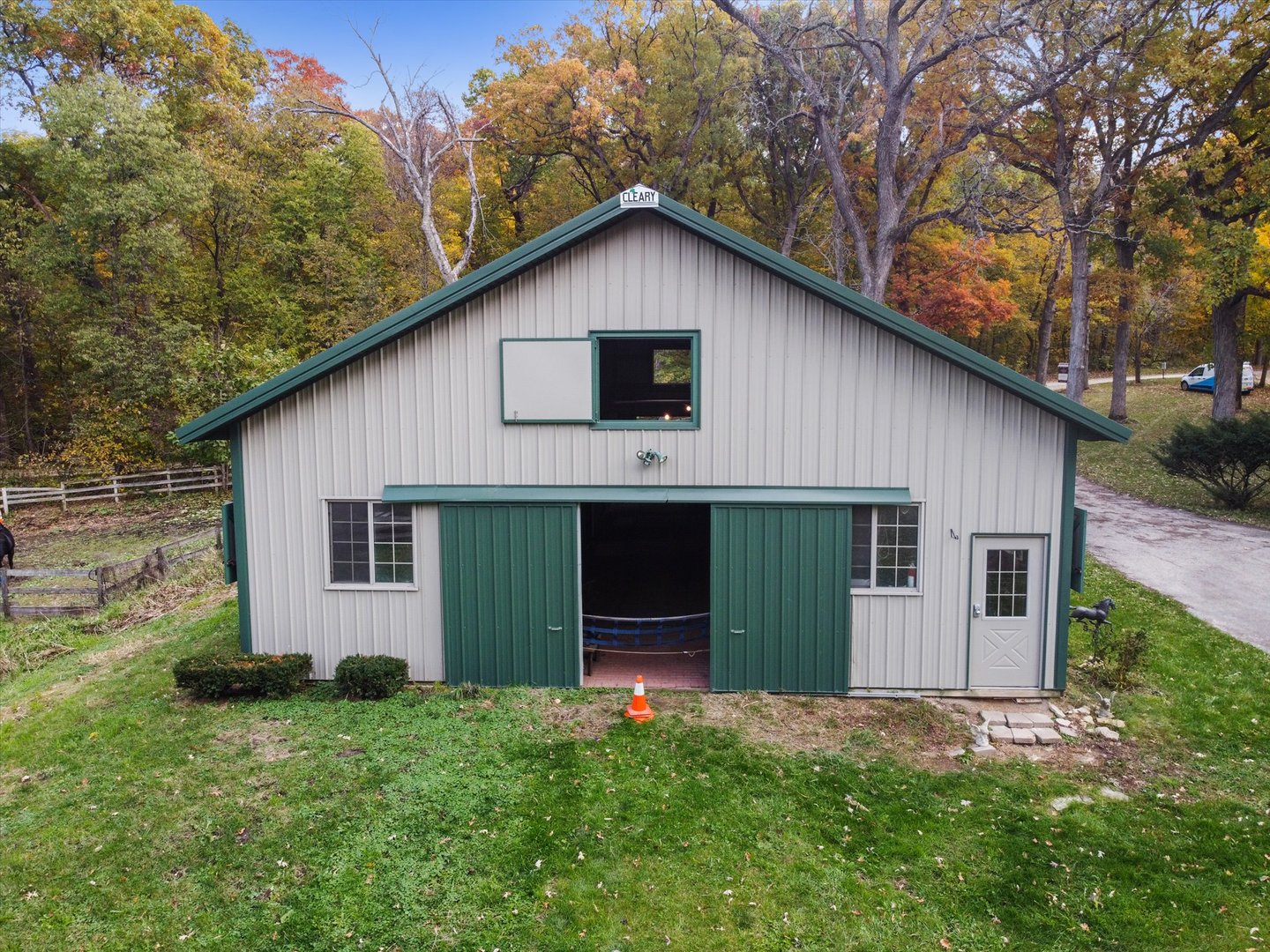 41W902 Hughes Road Elburn, IL 60119 - Photo 25 of 26 a front view of a house with a yard and garage