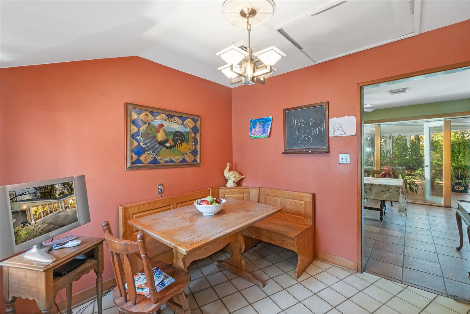 41W902 Hughes Road Elburn, IL 60119 - Photo 9 of 26 a workspace with furniture and a chandelier