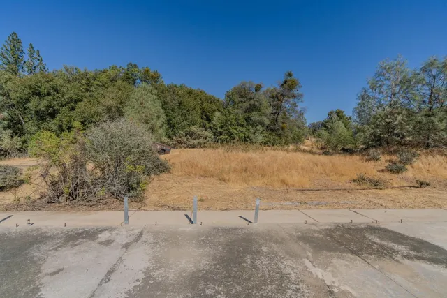 a view of a road with a yard