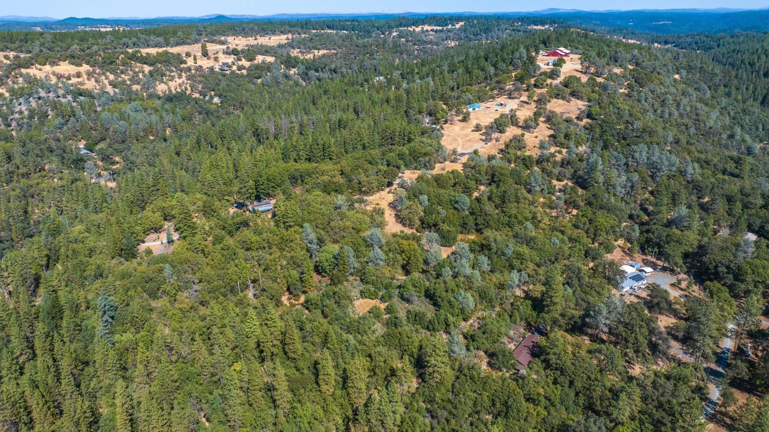 18871 Ponderosa Annex Road Sutter Creek, CA 95685 - Photo 23 of 31 an aerial view of residential houses with outdoor space and trees