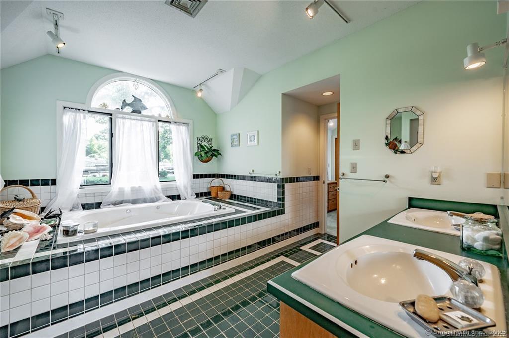 166 Old Colchester Road Salem, CT 06420 - Photo 12 of 13 a bedroom with a bed and window