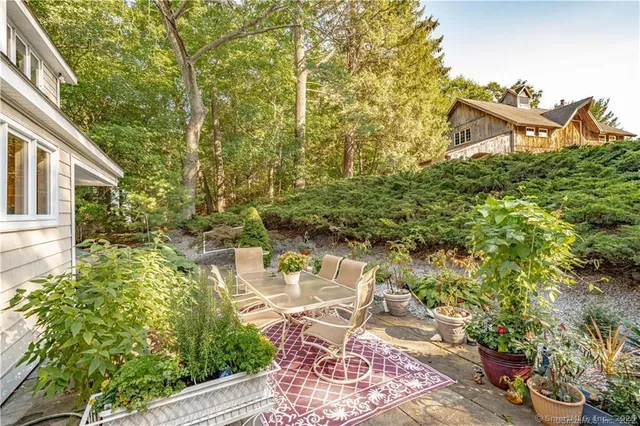 a view of yard with seating space