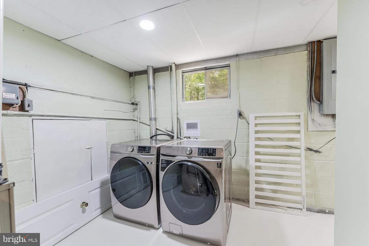 11621 Sourwood Lane Reston, VA 20191 - Photo 26 of 26 a view of a storage & utility room with washer and dryer