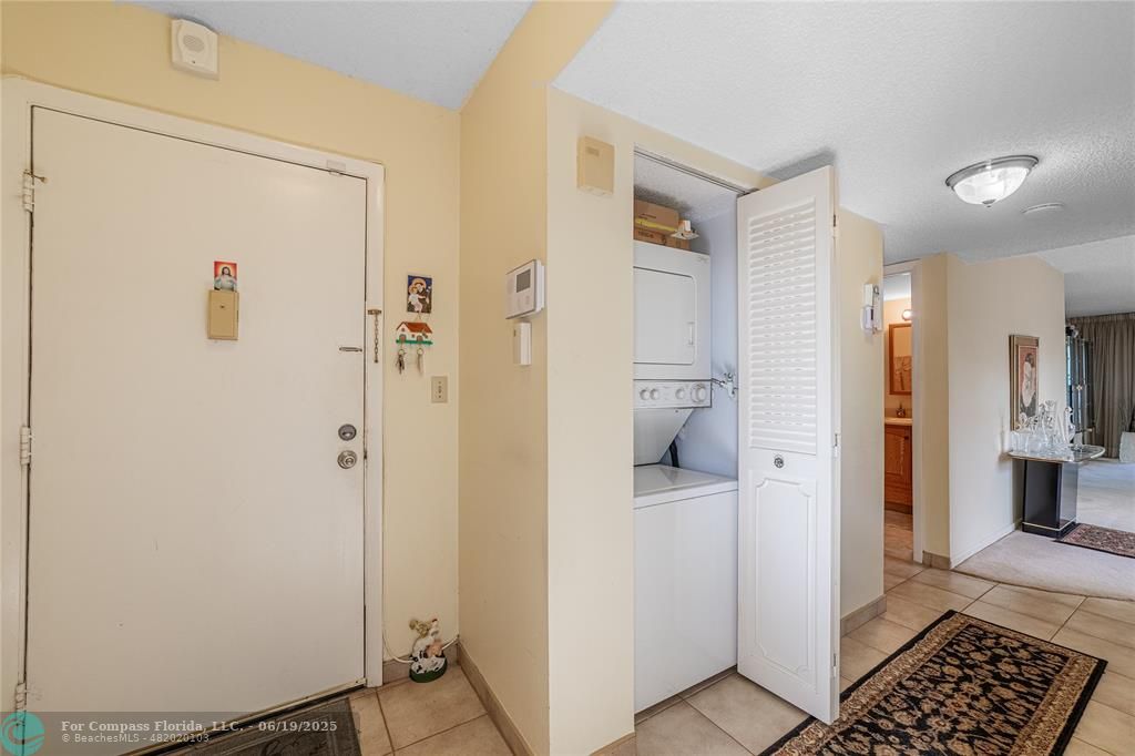 8305 Northwest 61st Street, Unit C215 Tamarac, FL 33321 - Photo 20 of 28 a bathroom with a shower and a sink