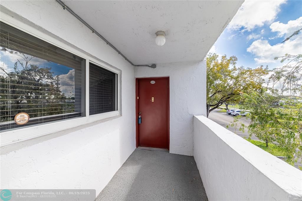 8305 Northwest 61st Street, Unit C215 Tamarac, FL 33321 - Photo 2 of 28 a view of a house and a window