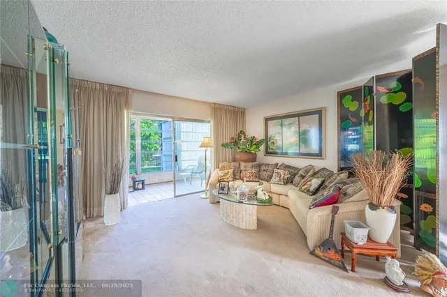 a view of livingroom with furniture and windows