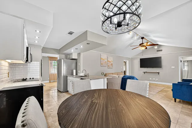 a very nice looking living room with a large window