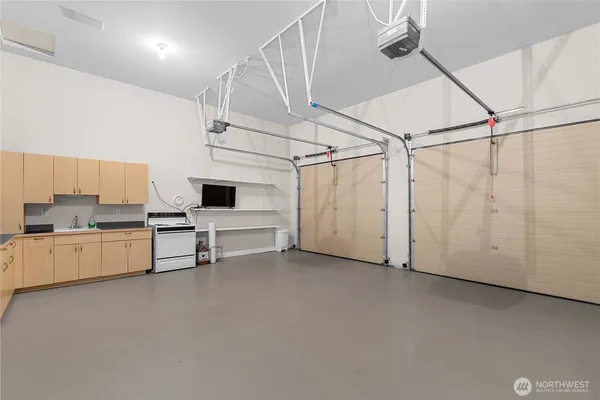 a view of storage and utility room with racks on the wall