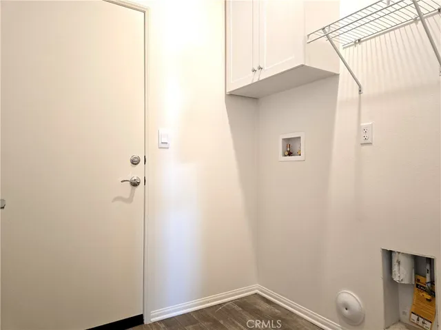 a bathroom with a sink and a white vanity