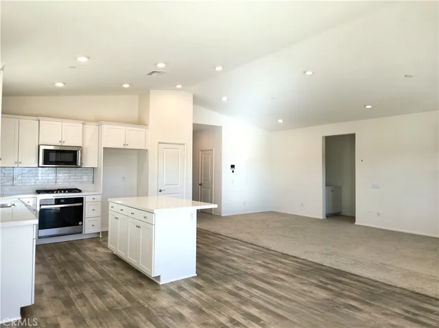 a view of a kitchen with a sink
