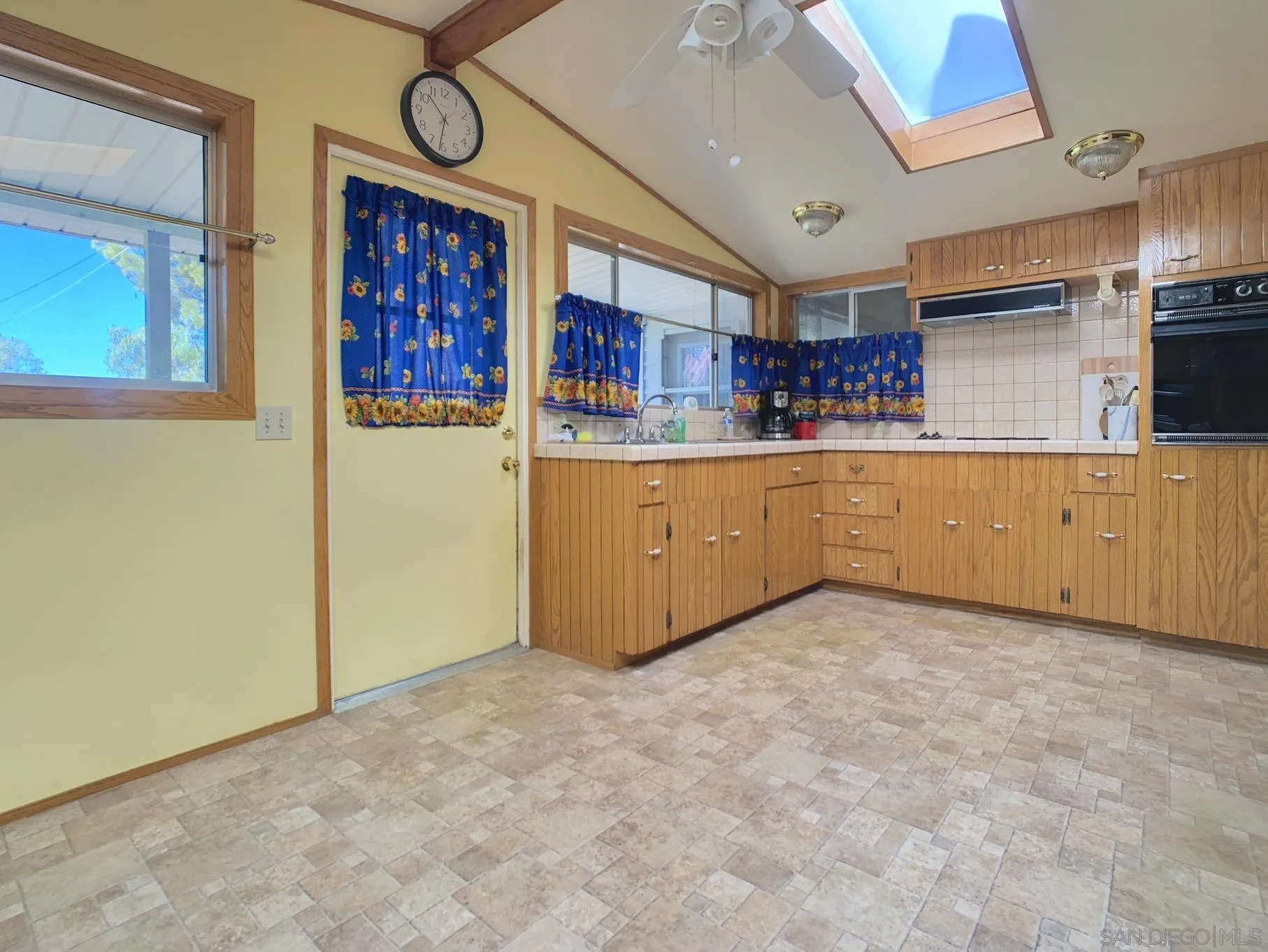 621 Alpine Heights Road Alpine, CA 91901 - Photo 19 of 28 a kitchen with stainless steel appliances granite countertop a stove a sink and a refrigerator