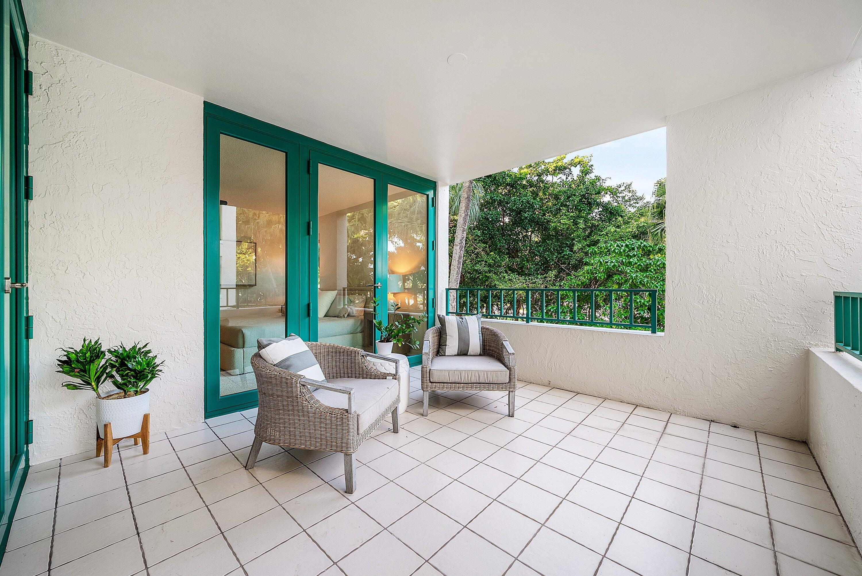 100 Southeast 5th Avenue, Unit 210 Boca Raton, FL 33432 - Photo 17 of 46 a living room with furniture and a potted plant