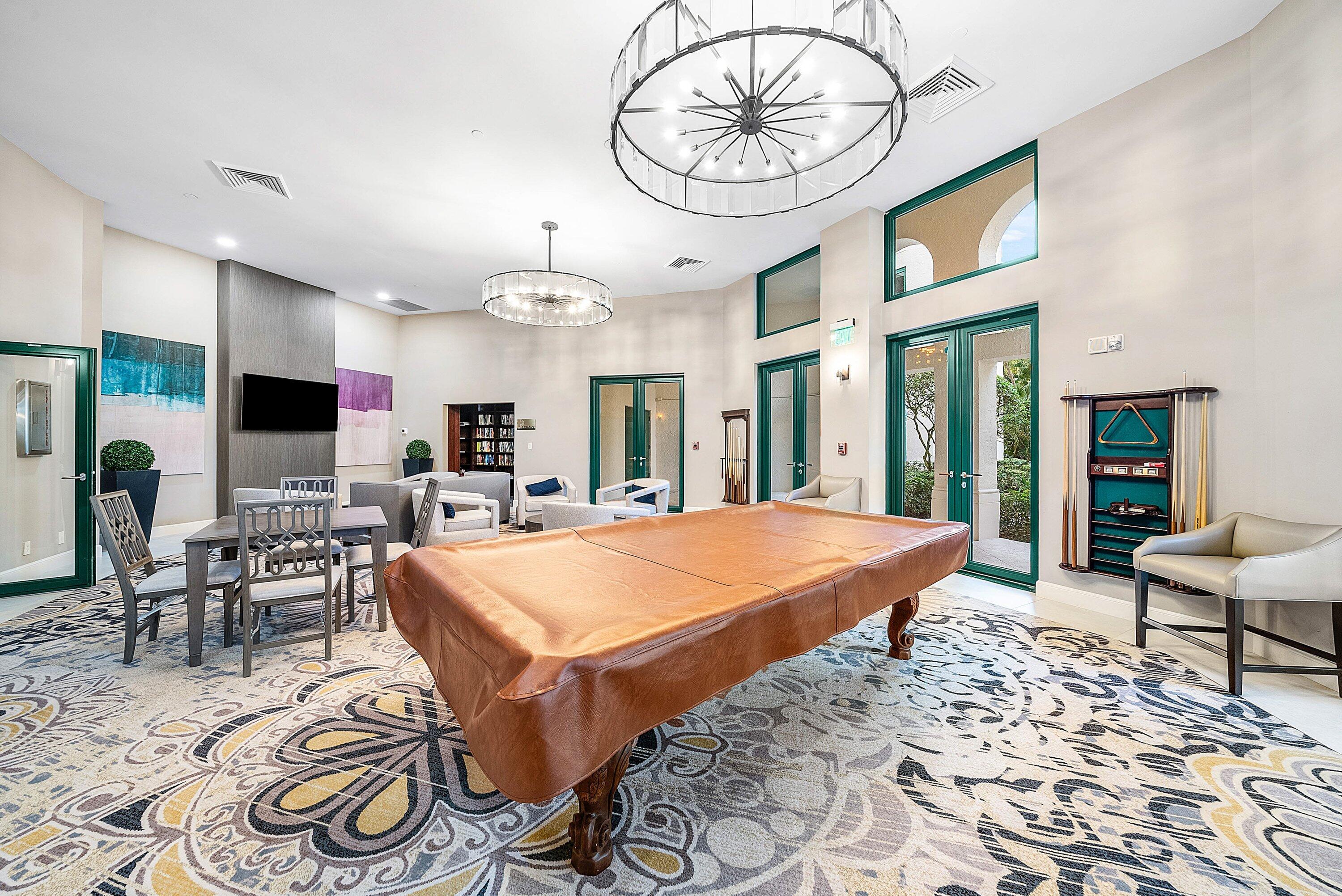 100 Southeast 5th Avenue, Unit 210 Boca Raton, FL 33432 - Photo 25 of 46 a very nice looking dining room with kitchen island