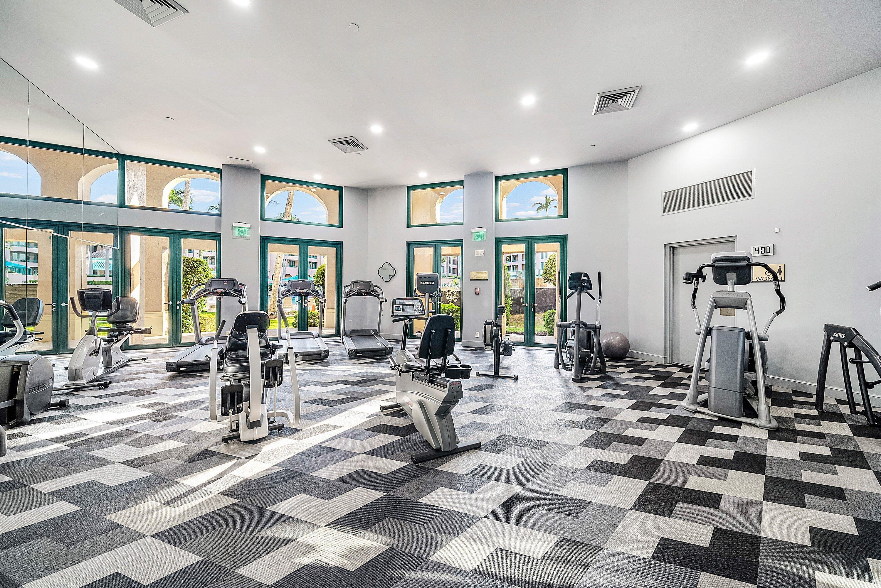 100 Southeast 5th Avenue, Unit 210 Boca Raton, FL 33432 - Photo 35 of 46 a view of a room with gym equipment and large window