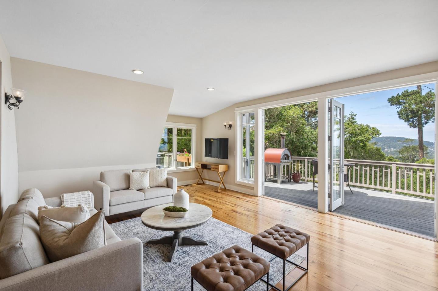 23865 Fairfield Place Carmel, CA 93923 - Photo 14 of 58 a living room with furniture and a large window
