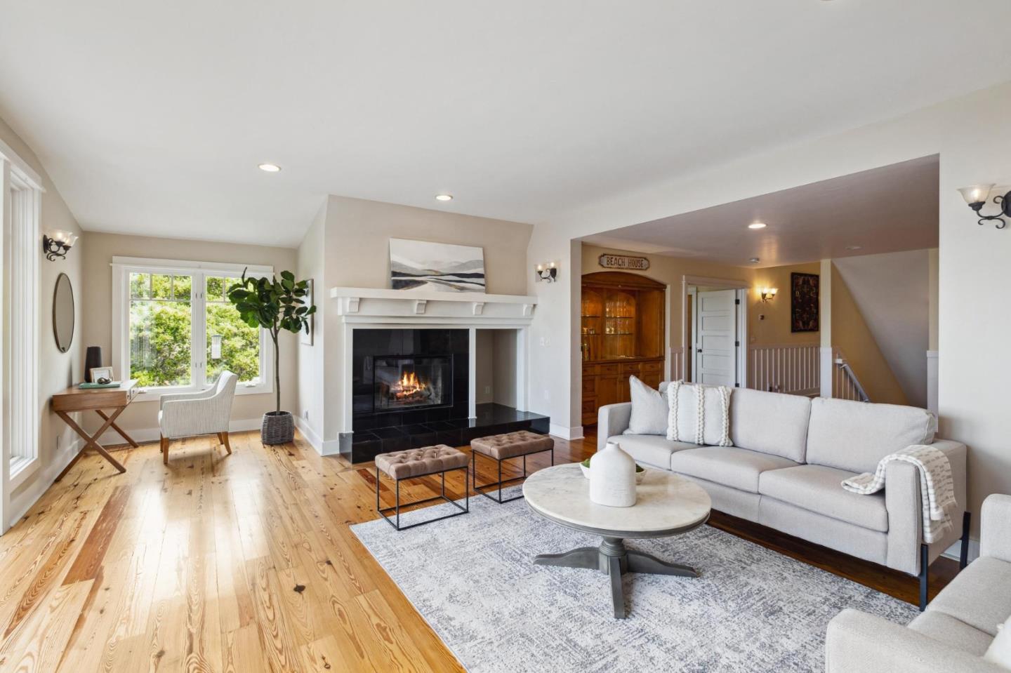 23865 Fairfield Place Carmel, CA 93923 - Photo 15 of 58 a living room with furniture and a fireplace