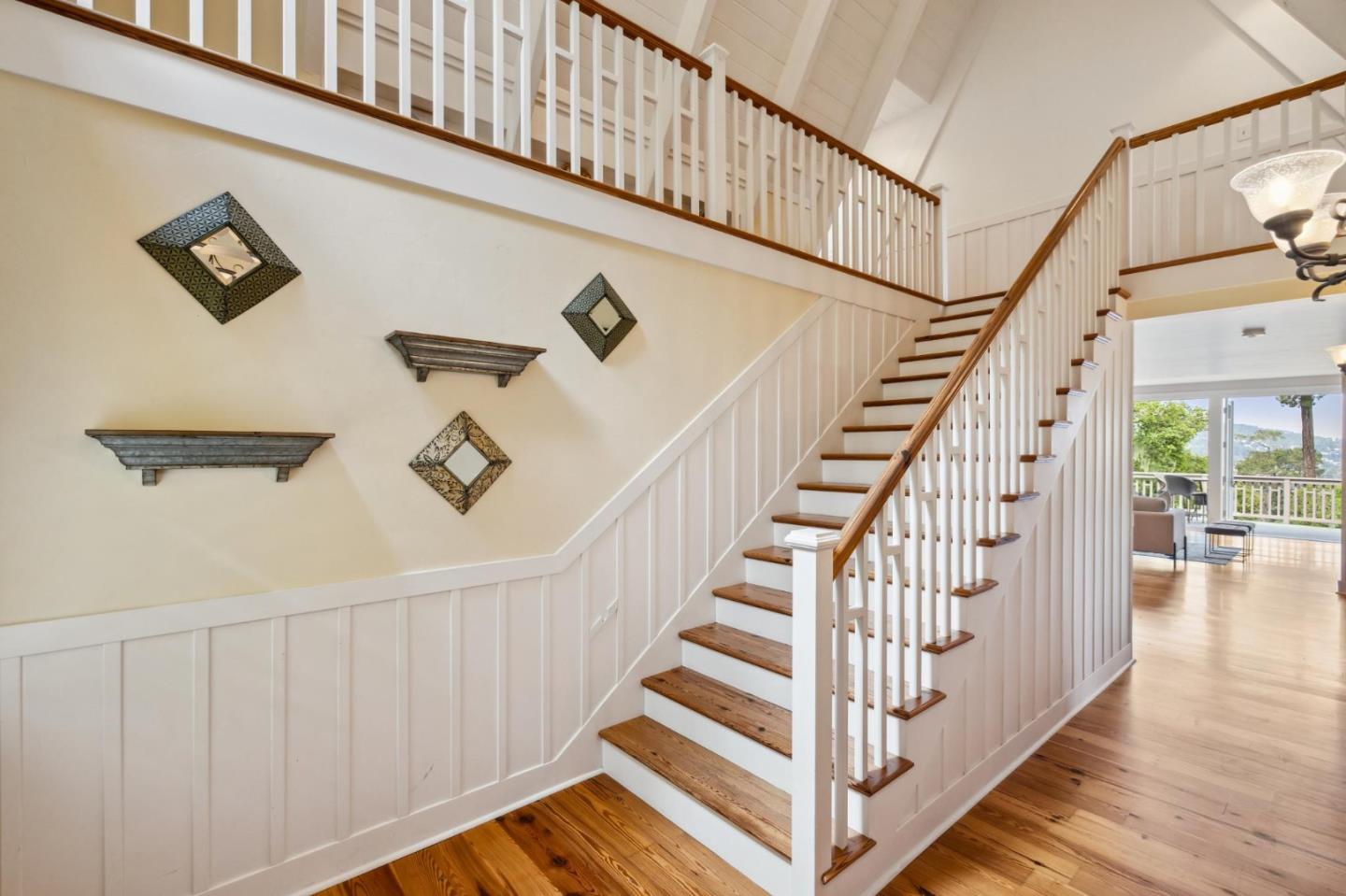 23865 Fairfield Place Carmel, CA 93923 - Photo 27 of 58 a view of staircase with railing and white walls